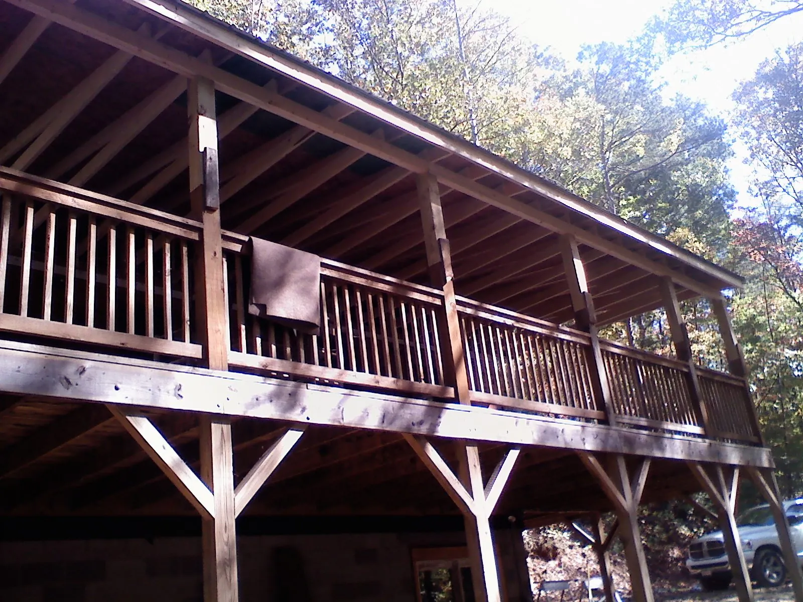 Timber framing under a new elevated porch and deck — Roof Leak Repair in Clatonia by Roofing Brothers